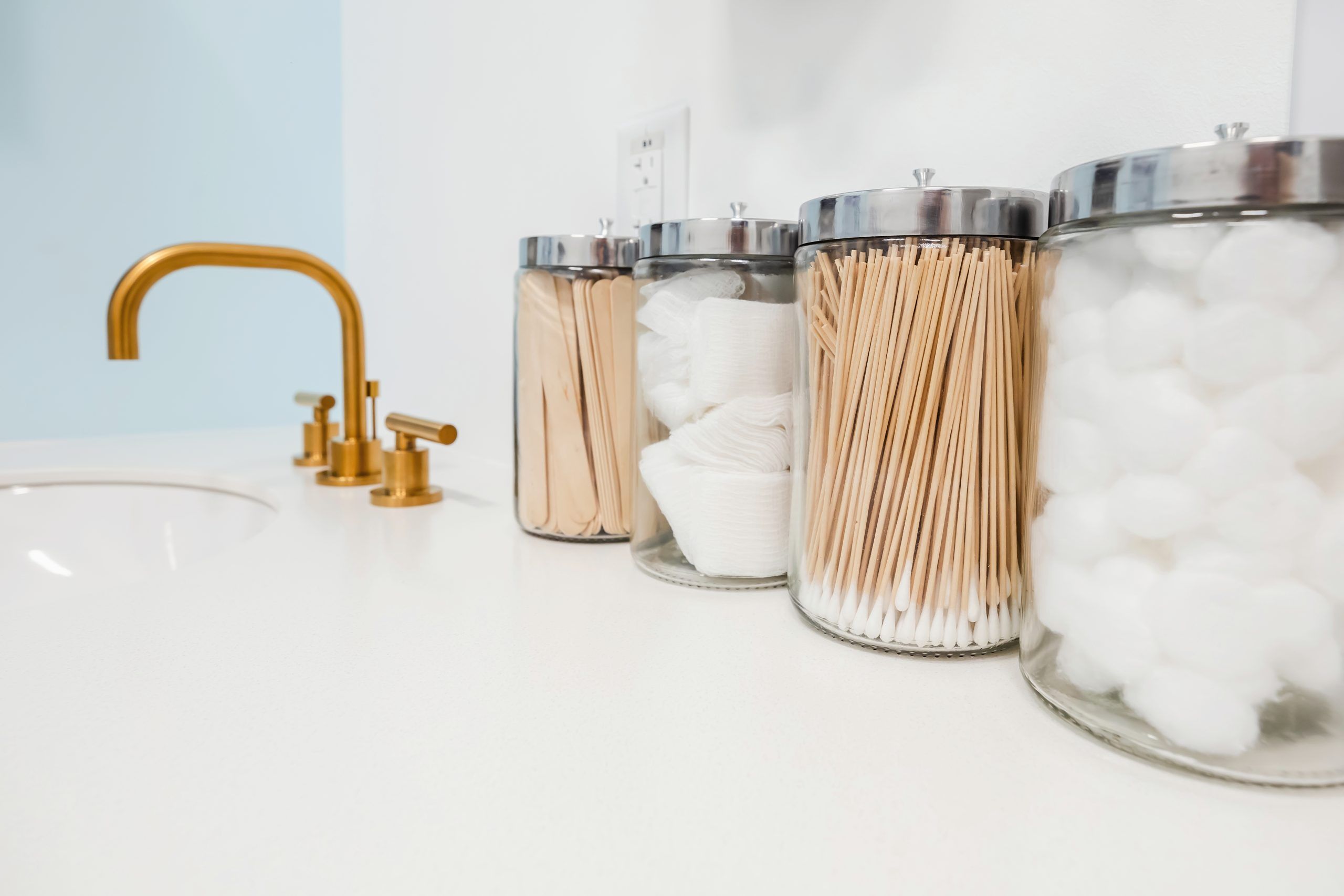 Essential supplies in a primary care setting: Glass containers with common items.